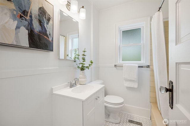 bathroom featuring vanity, toilet, tile patterned floors, a shower with curtain, and visible vents