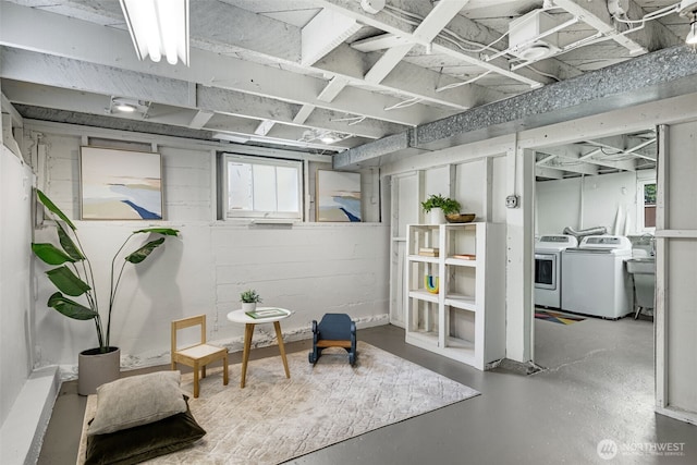 basement featuring washer and clothes dryer