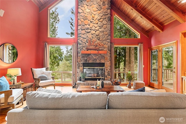 3337 Agate Heights Rd, Bellingham, WA 98226 - living area with beam ceiling, high vaulted ceiling, wooden ceiling, wood finished floors, and a wealth of natural light