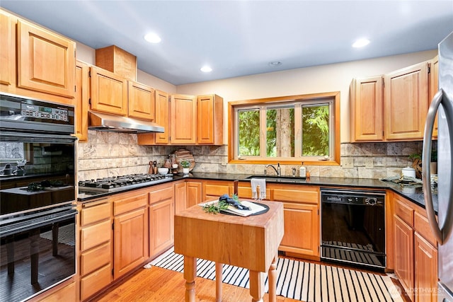 3337 Agate Heights Rd, Bellingham, WA 98226 - kitchen featuring decorative backsplash, dark countertops, a sink, black appliances, and under cabinet range hood
