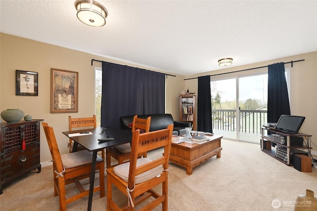 8100 Delridge Way SW Unit 1-3, Seattle, WA 98106 - dining area featuring light colored carpet and a textured ceiling