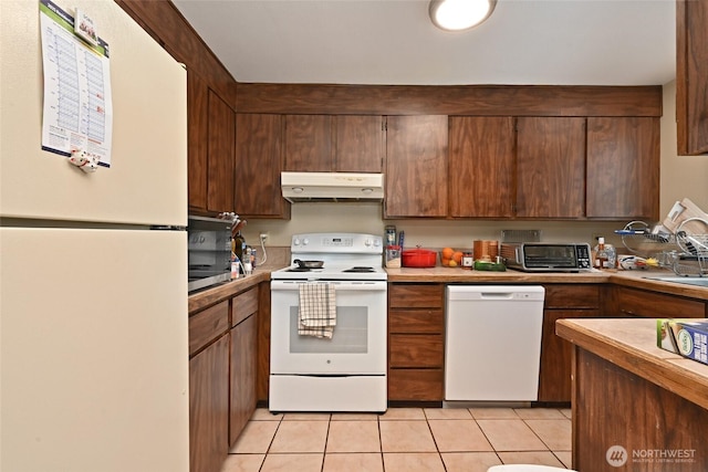 8100 Delridge Way SW Unit 1-3, Seattle, WA 98106 - kitchen with a toaster, light tile patterned flooring, white appliances, light countertops, and under cabinet range hood