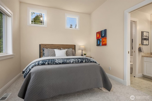 bedroom featuring carpet flooring, baseboards, and visible vents