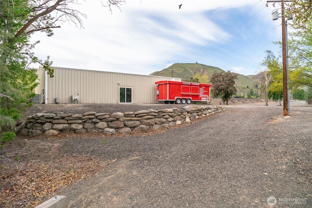 view of outdoor structure featuring a mountain view