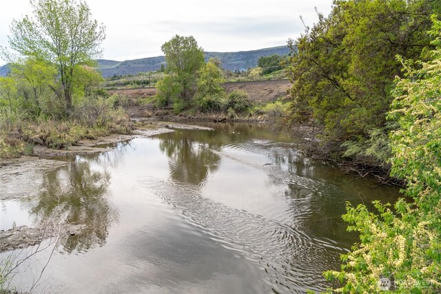 property view of water with a mountain view