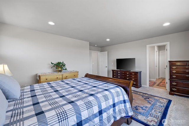 carpeted bedroom featuring recessed lighting