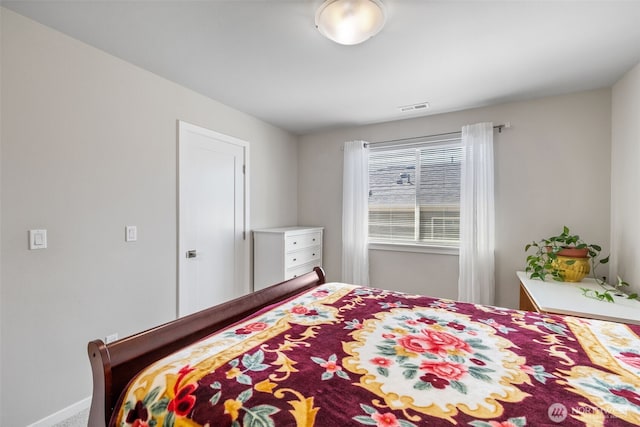 bedroom with visible vents
