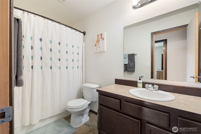 29304 39th Ave E, Graham, WA 98338 - bathroom with toilet, tile patterned floors, and vanity