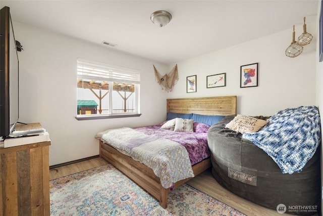 29304 39th Ave E, Graham, WA 98338 - bedroom with visible vents and wood finished floors