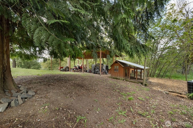 29304 39th Ave E, Graham, WA 98338 - view of yard with an outdoor structure