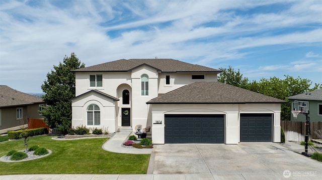 1614 W 51st Ave, Kennewick, WA 99337 - view of front of house with driveway, a garage, fence, a front lawn, and stucco siding