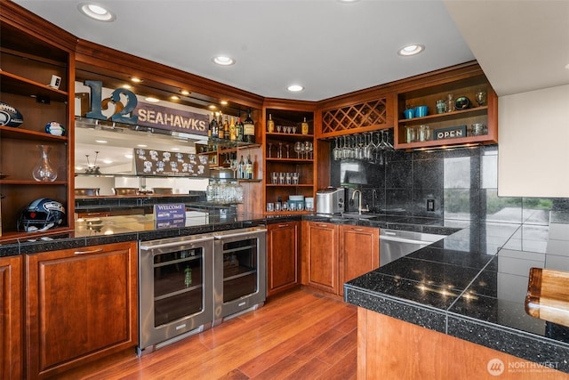 1614 W 51st Ave, Kennewick, WA 99337 - bar featuring indoor wet bar, decorative backsplash, wood finished floors, and beverage cooler