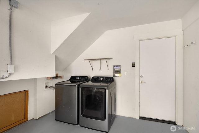 washroom featuring laundry area and washing machine and dryer