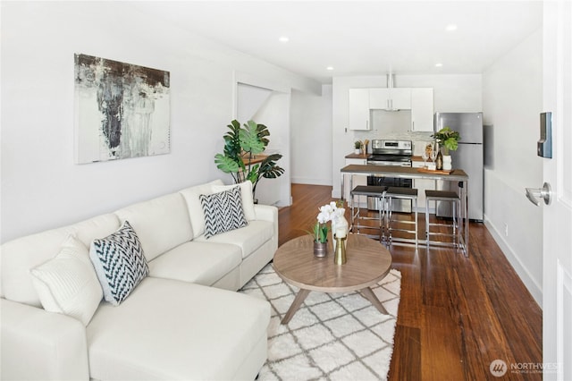 3003 E Pine St, Seattle, WA 98122 - living area with wood finished floors, recessed lighting, and baseboards