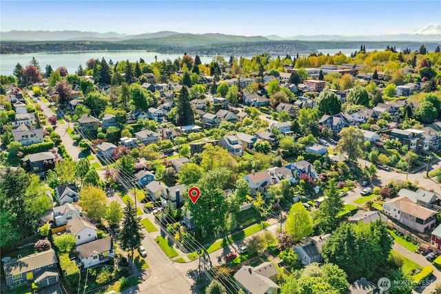 3003 E Pine St, Seattle, WA 98122 - aerial perspective of suburban area with a water and mountain view