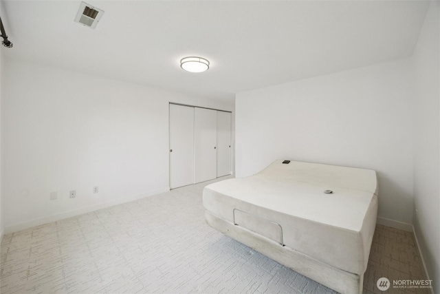 18 SE 18th St, Battle Ground, WA 98604 - unfurnished bedroom with baseboards and a closet