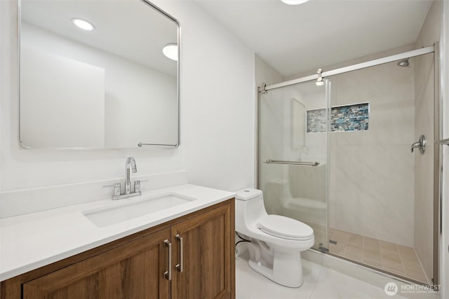 18 SE 18th St, Battle Ground, WA 98604 - bathroom with toilet, vanity, a stall shower, and tile patterned floors