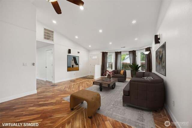 18 SE 18th St, Battle Ground, WA 98604 - living room with baseboards, ceiling fan, recessed lighting, light wood-type flooring, and high vaulted ceiling
