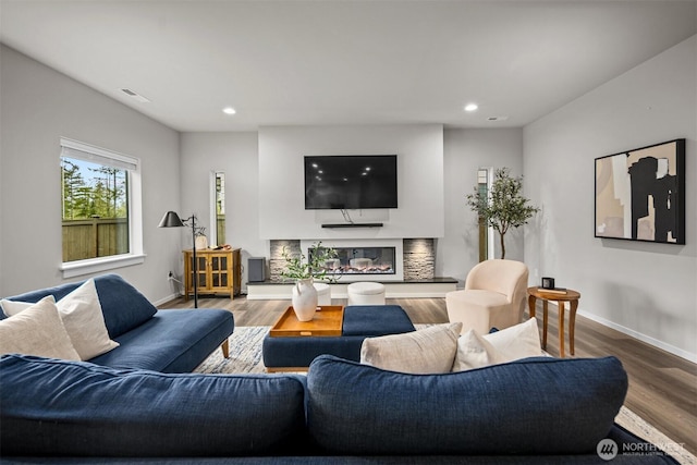 33455 Holly Ave SE, Black Diamond, WA 98010 - living area with recessed lighting, baseboards, visible vents, and wood finished floors