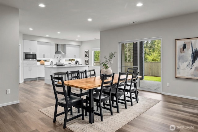 33455 Holly Ave SE, Black Diamond, WA 98010 - dining room with visible vents, recessed lighting, wood finished floors, and a wealth of natural light
