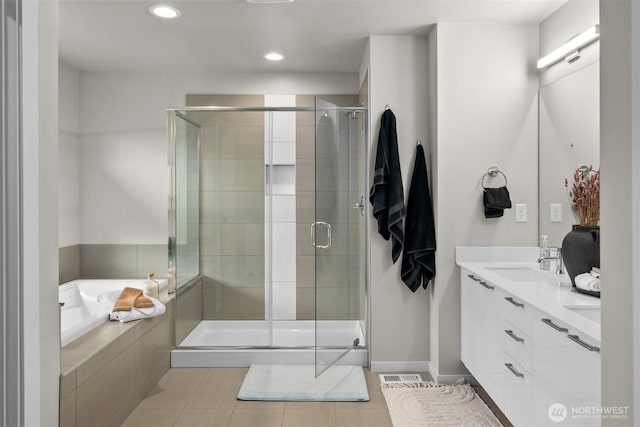 33455 Holly Ave SE, Black Diamond, WA 98010 - full bathroom with a garden tub, a sink, tile patterned flooring, and a stall shower