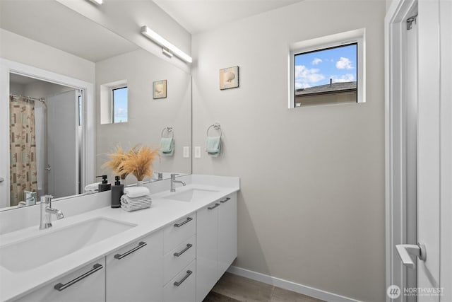 33455 Holly Ave SE, Black Diamond, WA 98010 - full bathroom with double vanity, a sink, baseboards, and a shower with curtain