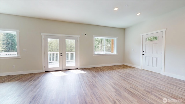 15941 Glenwood Rd SW, Port Orchard, WA 98367 - interior space with french doors, recessed lighting, baseboards, and light wood-type flooring