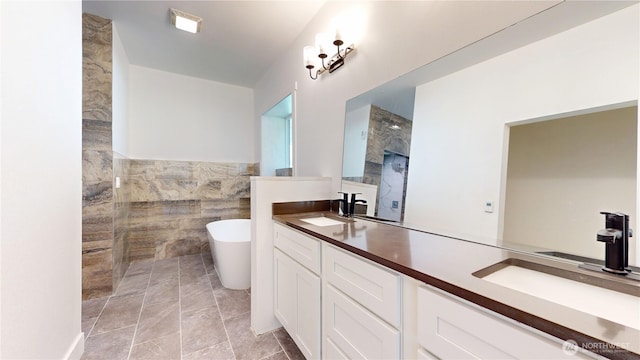 15941 Glenwood Rd SW, Port Orchard, WA 98367 - bathroom featuring tiled shower, double vanity, tile walls, and a sink