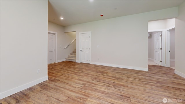 15941 Glenwood Rd SW, Port Orchard, WA 98367 - unfurnished room featuring baseboards, recessed lighting, light wood finished floors, and stairway