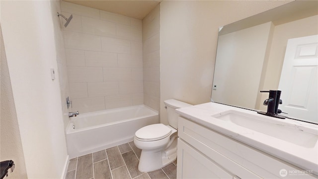 15941 Glenwood Rd SW, Port Orchard, WA 98367 - full bath featuring vanity, shower / bathing tub combination, wood tiled floor, and toilet