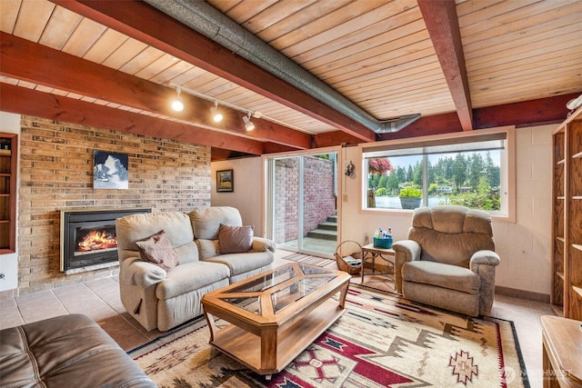 living area with a fireplace, wood ceiling, beamed ceiling, and rail lighting