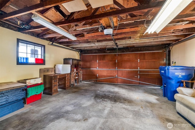 garage featuring a garage door opener