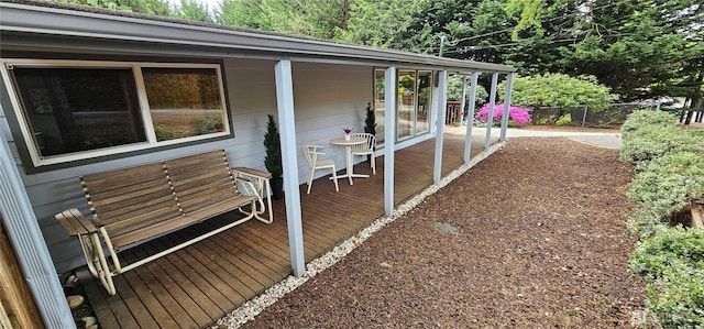 view of home's exterior featuring fence