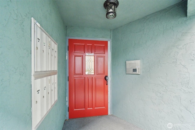 property entrance featuring stucco siding
