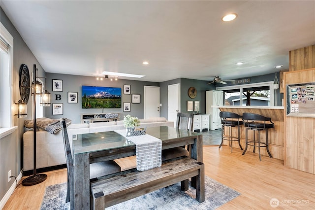 dining area with wood finished floors, recessed lighting, and ceiling fan