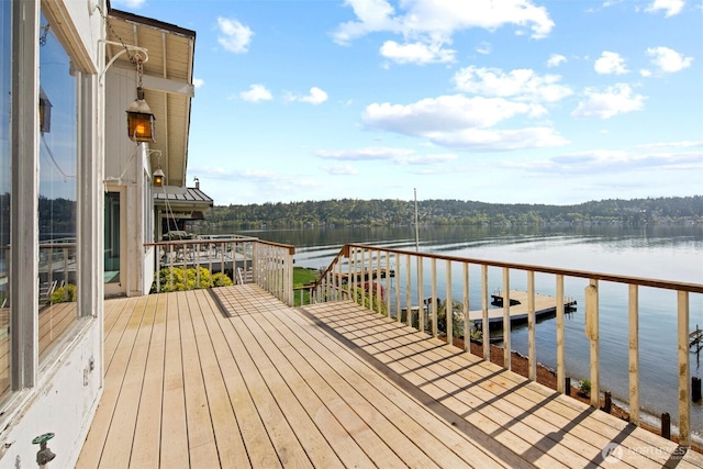 deck featuring a water view
