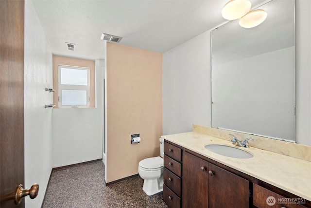bathroom with visible vents, baseboards, toilet, and vanity