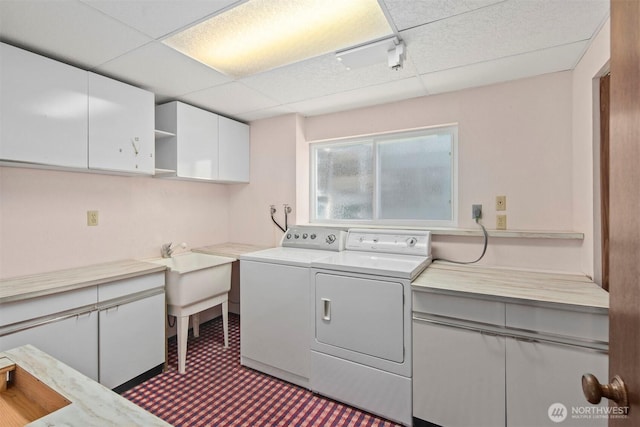 laundry room with cabinet space and independent washer and dryer