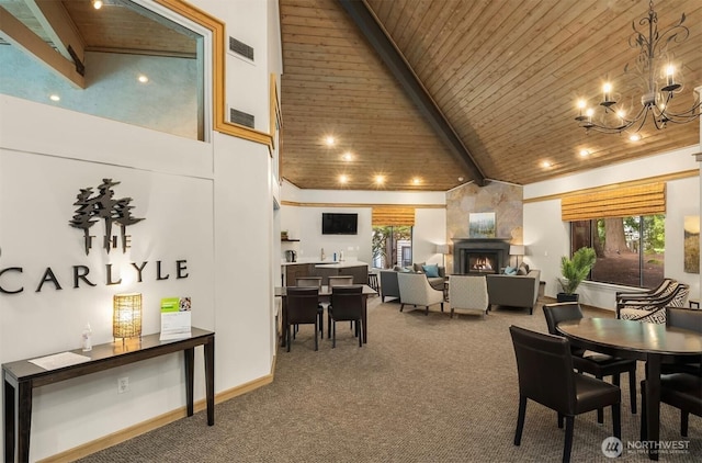 dining space featuring carpet floors, high vaulted ceiling, a notable chandelier, and beam ceiling