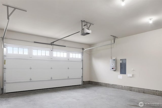 garage with baseboards, a garage door opener, and electric panel
