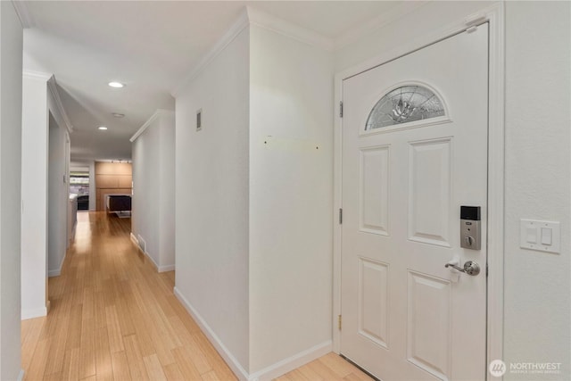2606 174th Ave NE, Redmond, WA 98052 - foyer featuring visible vents, baseboards, light wood-style floors, ornamental molding, and recessed lighting