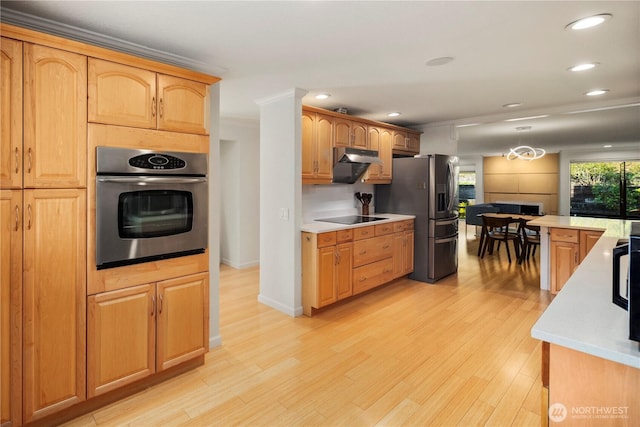 2606 174th Ave NE, Redmond, WA 98052 - kitchen with light countertops, recessed lighting, appliances with stainless steel finishes, and light wood-style floors