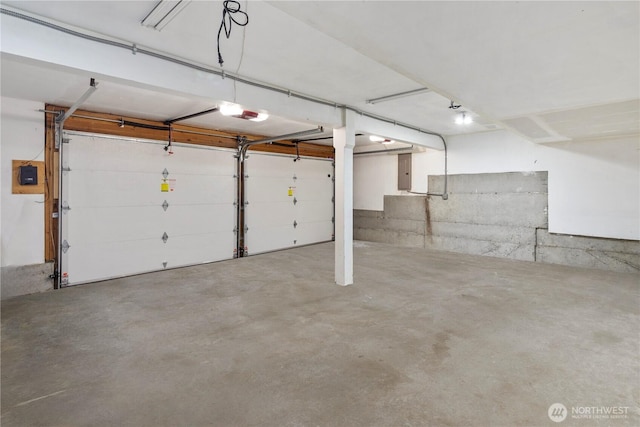 2606 174th Ave NE, Redmond, WA 98052 - garage featuring a garage door opener and electric panel