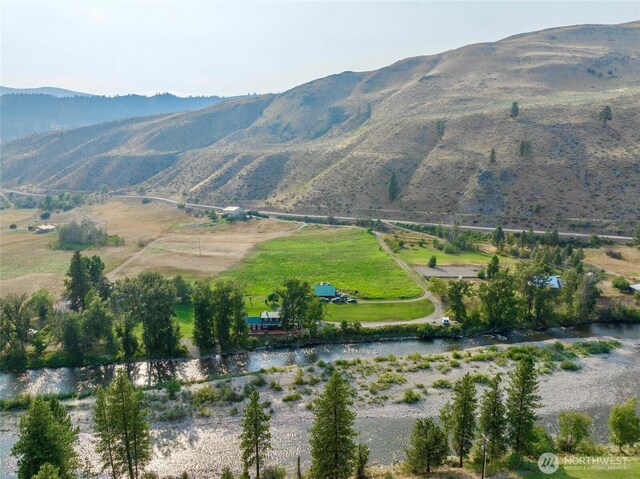 property view of mountains featuring a rural view
