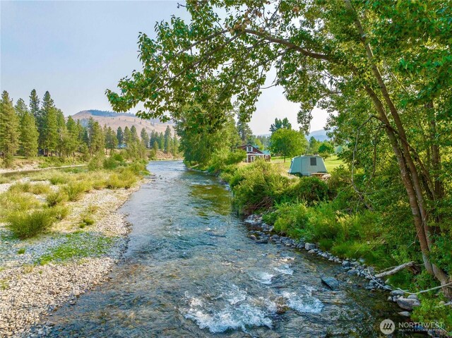 property view of water featuring a mountain view