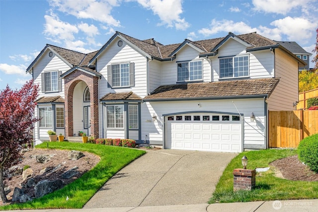 4602 Country Club Dr NE, Tacoma, WA 98422 - traditional-style home featuring fence, driveway, and an attached garage
