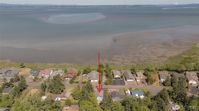 659 Chinook Ave SE, Ocean Shores, WA 98569 - aerial view of property and surrounding area with nearby suburban area