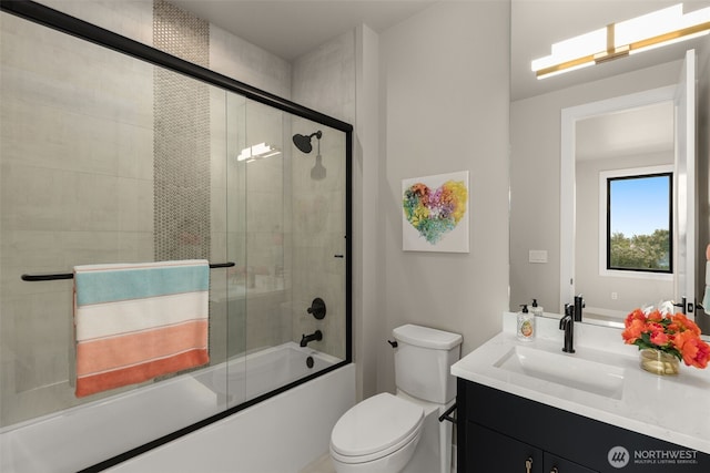 bathroom featuring bath / shower combo with glass door, vanity, and toilet