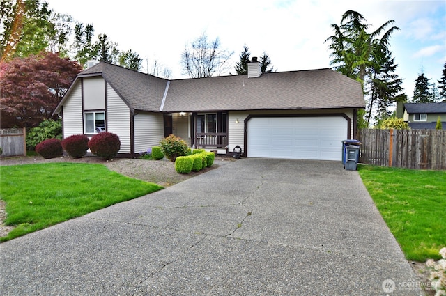 ranch-style home with aphalt driveway, a chimney, fence, a front lawn, and an attached garage