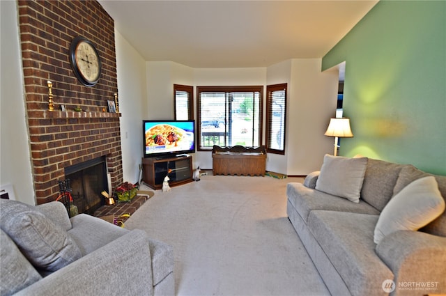 living room featuring carpet floors and a fireplace